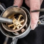 Primus Omnifuel II multifuel brander met brandstoffles en tas